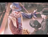 Clown gives the Morettis a flower