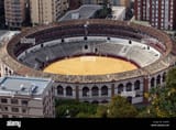 bull-ring-in-city-center-malaga-spain-historic-round-colosseum-with-C538Y0-4037292115