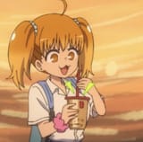 yoshi plays with her boba tea