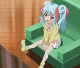 loli sitting on a couch swinging her legs