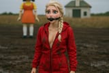 20250614_1616_Elsa in Squid Game_simple_compose_01jxqcp46yepytgee15n856qyh