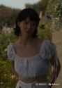 401682127621054466_A_woman_standing_outside_wind_thumb.jpg
