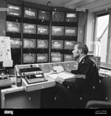subway-safety-in-the-1970s-the-feed-from-the-subway-surveillance-cameras-are-monitored-a-man-in-the-control-room-have-many-different-monitors-in-front-of-him-and-his-job-is-to-alert-security-police-or-ambulance-if-h