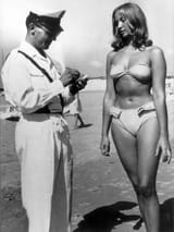 police-officer-ticketing-a-woman-for-wearing-a-bikini