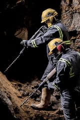 two-workers-helmet-protective-suit-600nw-1505126366