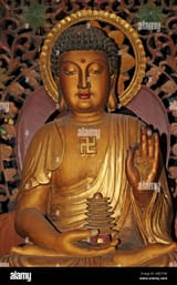 buddha-figure-with-swastika-on-chest-at-chinese-buddhist-temple-wat-phanan-choeng-ayutthaya-thailand-2BE7Y9K