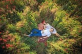 couple-lying-in-a-field