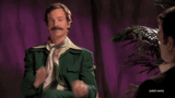 man-throwing-glitter-conffeti-lhetplarcmuyvtbn