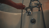 turn-on-bath-tub-faucet-water-pouring-nfg6v6m441zcuc9i