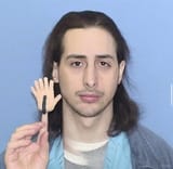 puppet-hand-raised-curiously-shane