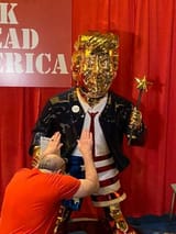 praise trump golden idol