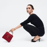 Lily-Collins-Panthere-Cartier-Bag-Campaign03-768x768-1846708554