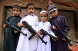 children-play-toy-guns-during-eid-al-fitr-550nw-9717671c