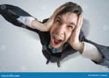 young-schizophrenic-man-suffers-headache-covering-his-ears-hands