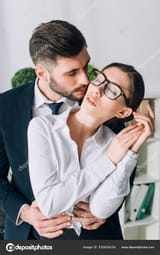 depositphotos_335636326-stock-photo-handsome-businessman-hugging-kissing-secretary