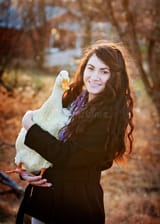 teenage-girl-her-pet-duck-teen-holding-outdoors-farm-yard-48502905