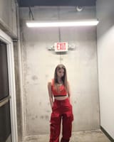 red Dami egress and they chose a red exit sign and not the green one good photo composition