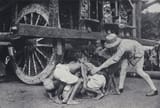 M442243_Hindu-attempting-to-get-themselves-crushed-under-the-wheels-of-the-car-of-Jagannath-Juggernaut-in-the-belief-they