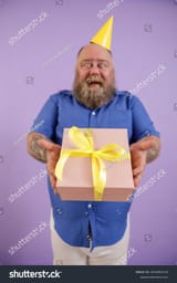 stock-photo-emotional-middle-aged-fat-man-wearing-blue-shirt-and-yellow-hat-stands-on-purple-background-in-2032905734