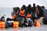 thesun.co.uknews202506taxpayers-1million-week-migrant-lawyers