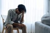 asian-young-upset-depressed-man-600nw-2416418631