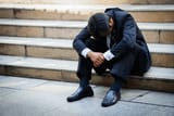 stressed-businessman-sitting-stairway-outdoorbankrupt-600nw-569791687_jpg