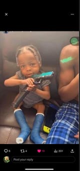 nigger kid with gun