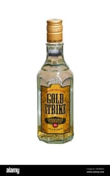 brussels-belgium-12-february-2022-bottle-of-gold-strike-spirits-made-from-cinnamon-liqueur-in-which-real-gold-flakes-are-added-2HN0M24