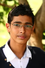young-indian-boy-spiked-hair-specs-18794554