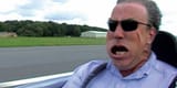 Jeremy-Clarkson-with-his-face-blown-back-on-the-track-on-Top-Gear