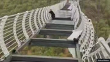 Screenshot 2025-07-13 at 20-40-21 China Man left dangling from bridge after glass breaks
