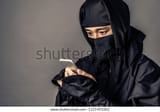 japanese-ninja-calling-smart-phone-600w-1221491062