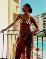 gina-torres-bikini-1-071425-1caf0fca37ab4a4aa6629457626fdc75