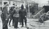 rudolf_hoess_with_executioners.jpg__1536x1536_q85_subsampling-2