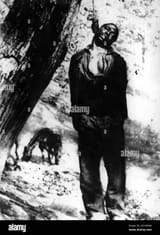 an-african-american-man-hanged-from-a-tree-in-the-southern-states-of-the-united-states-undated-photo-automated-translation-2GY4RHM