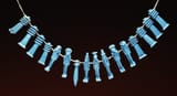 Egyptian_-_Group_of_16_Amulets_Strung_as_a_Necklace_-_Walters_481685-1699_-_View_A