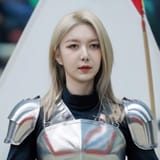 a woman in Polish battled armor