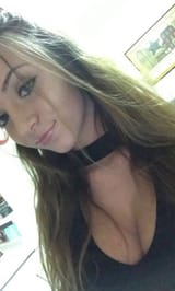 black shirt black choker up close