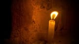 depositphotos_41903263-stock-video-video-1920x1080-candle-closeup-ancient