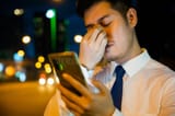 businessman-frustration-rubbing-tired-eyes-smartphone-use-suit-using-night-due-to-eye-strain-serious-care-314821473-3336348156