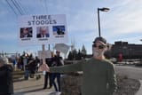 Three-stooges-sign-Tesla-protest