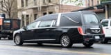 hearse-or-funeral-car-on-the-street-1000x500