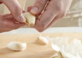 102046990_Peeling-Garlic_Photo-by-Meredith-d5239faa09d5468381dfb123ebaba9cb
