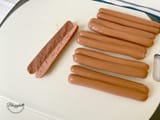 cutting-hot-dogs-in-half-lengthwise