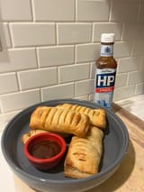 hp sauce with sausage rolls