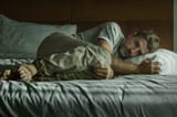 young-attractive-sad-depressed-man-crying-helpless-bed-home-bedroom-feeling-overwhelmed-desperate-suffering-dramatic-157447831