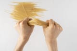 Breaking pasta