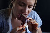 Crystal-Cartier-bbq-woman-eating-ribs-42660727