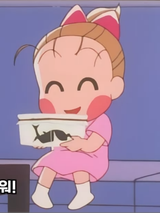 Danbi holding a beetle