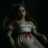 20250614_2324_Creepy Ariel Doll_simple_compose_01jxrssetsf8hab4p41wttzksc